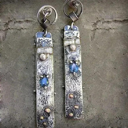 Handmade earrings made of blue stone