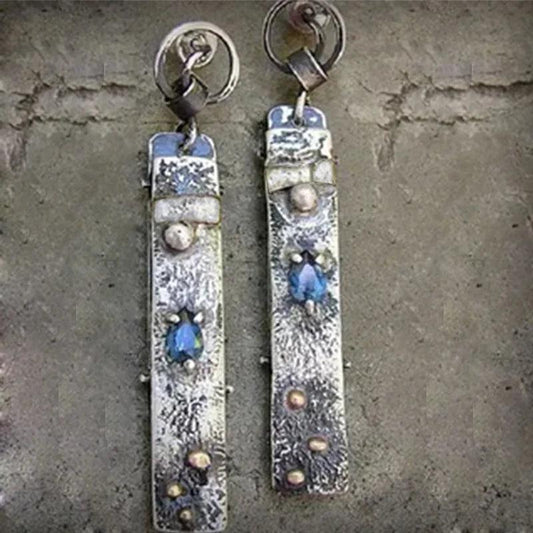Handmade earrings made of blue stone