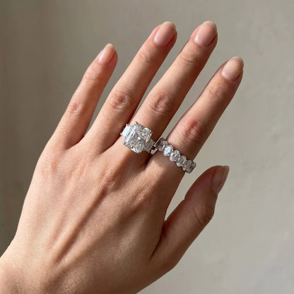 Luxurious Three Stone Radiant Cut Wedding Ring Set
