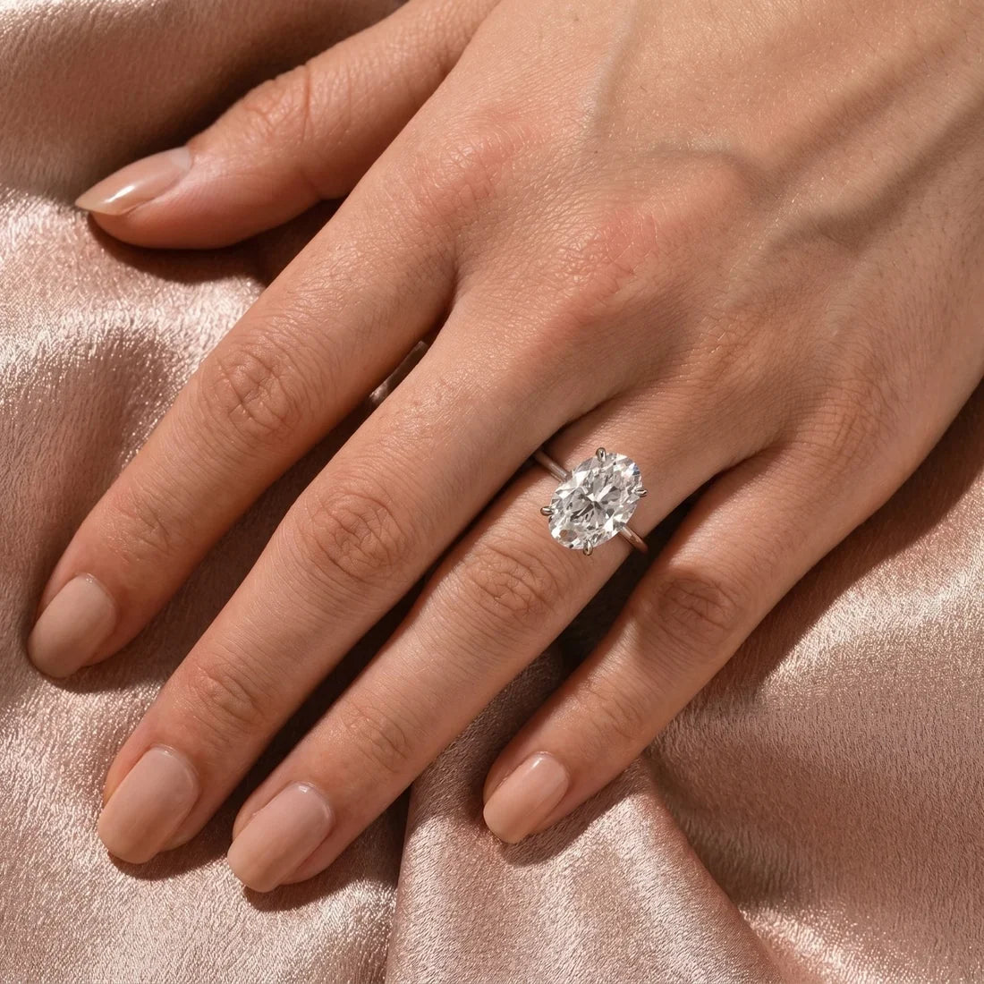Oval Cut Hidden Halo Engagement Ring