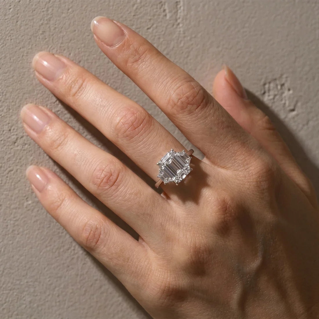 Emerald Cut Three Stone Engagement Ring