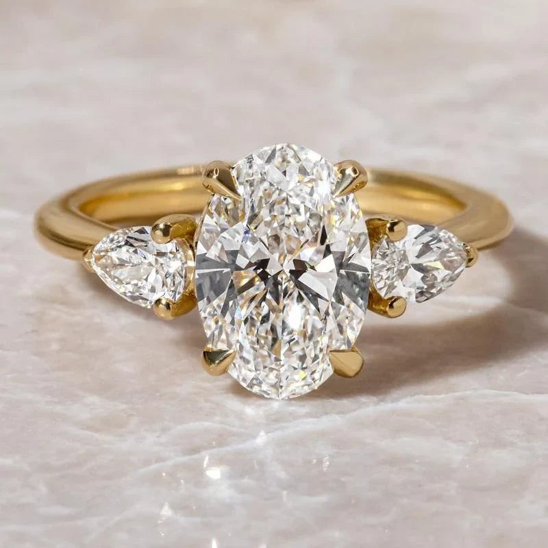 Oval Cut Three Stone Engagement Ring