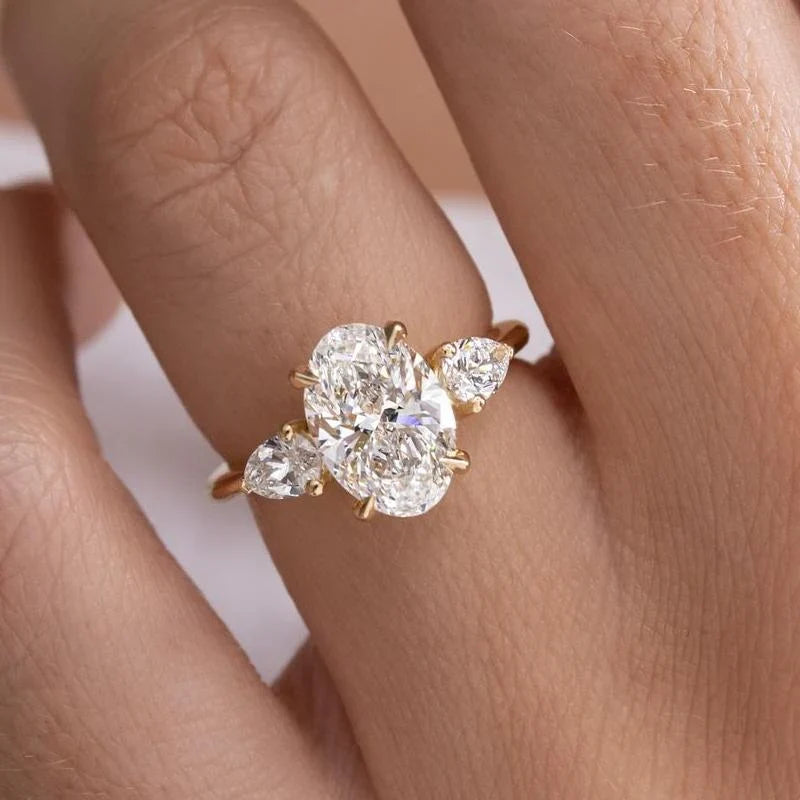Oval Cut Three Stone Engagement Ring
