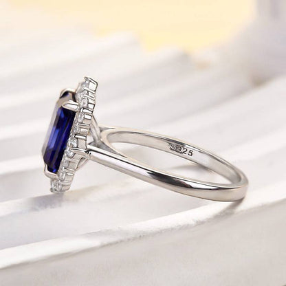 Halo Emerald Cut Blue Sapphire Ring